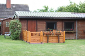 Haus Seerobbe-Blockhaus im Garten
